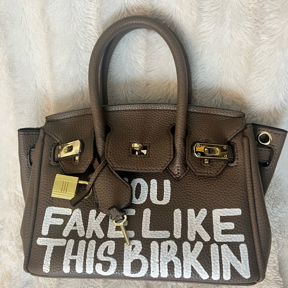 Stylish Brown Satchel with Gold Accents